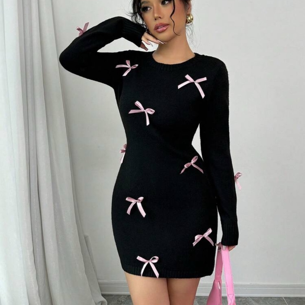 Elegant Black Dress with Pink Accents